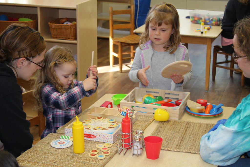 ECE students working with children